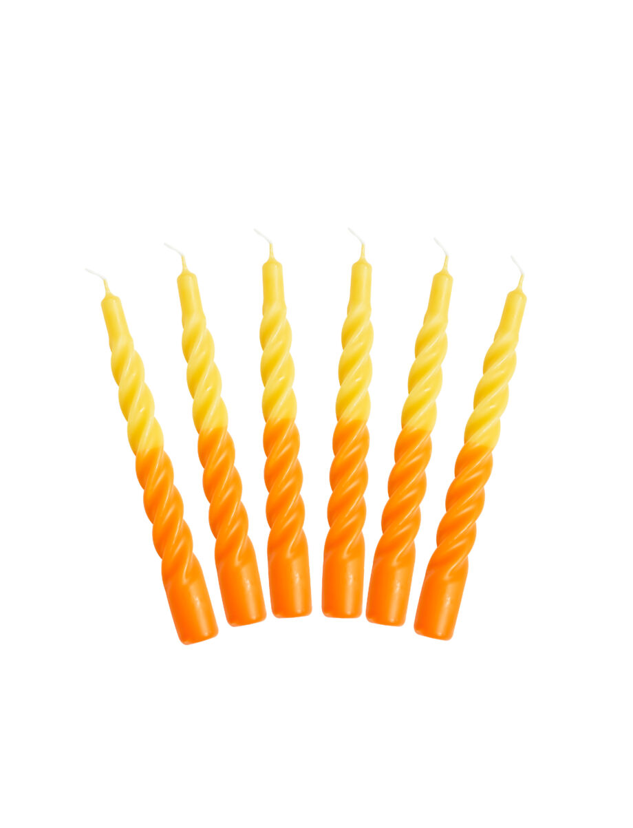 yellow and orange twisted candles