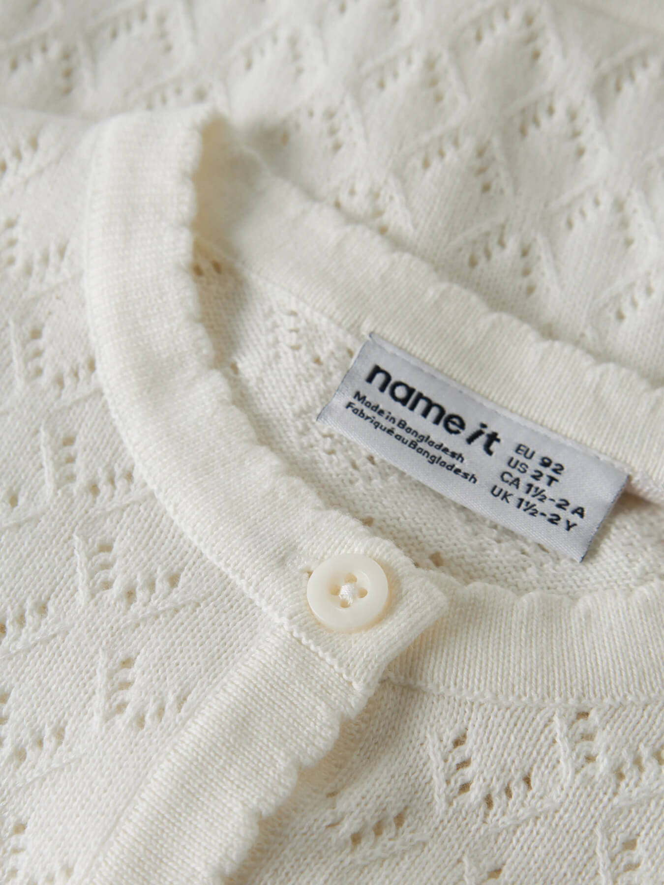 Weisse Cardigan aus Pointelle-Strick